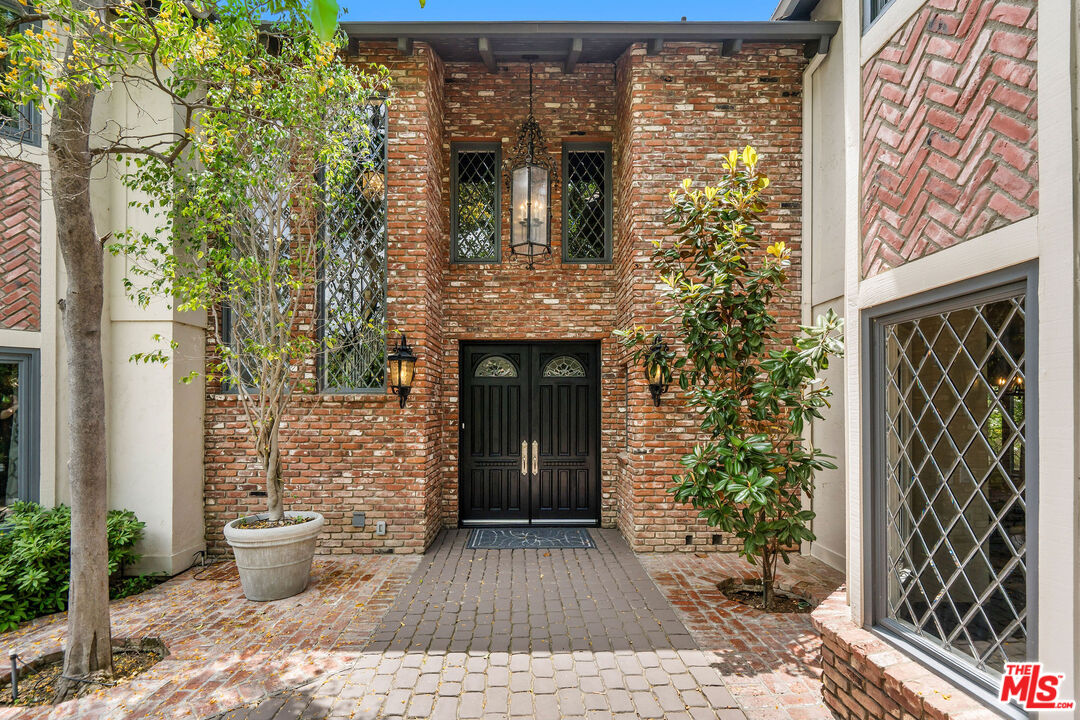 204 Bell Cyn Road Bell Canyon, CA 91307 - Photo 5 of 75 a view of a entryway door front of house