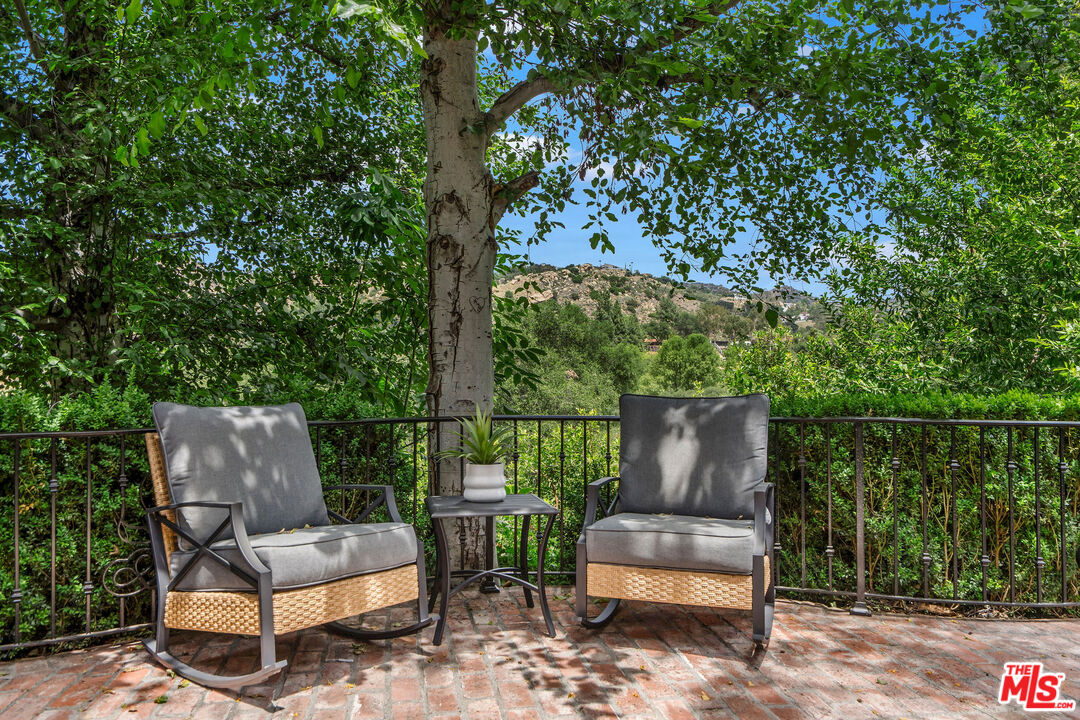 204 Bell Cyn Road Bell Canyon, CA 91307 - Photo 6 of 75 a outdoor living space with furniture and garden view