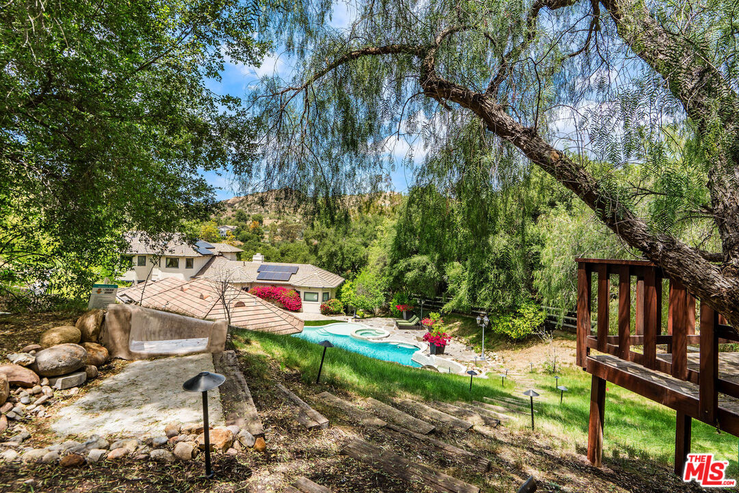 204 Bell Cyn Road Bell Canyon, CA 91307 - Photo 61 of 75 a backyard of a house with seating space