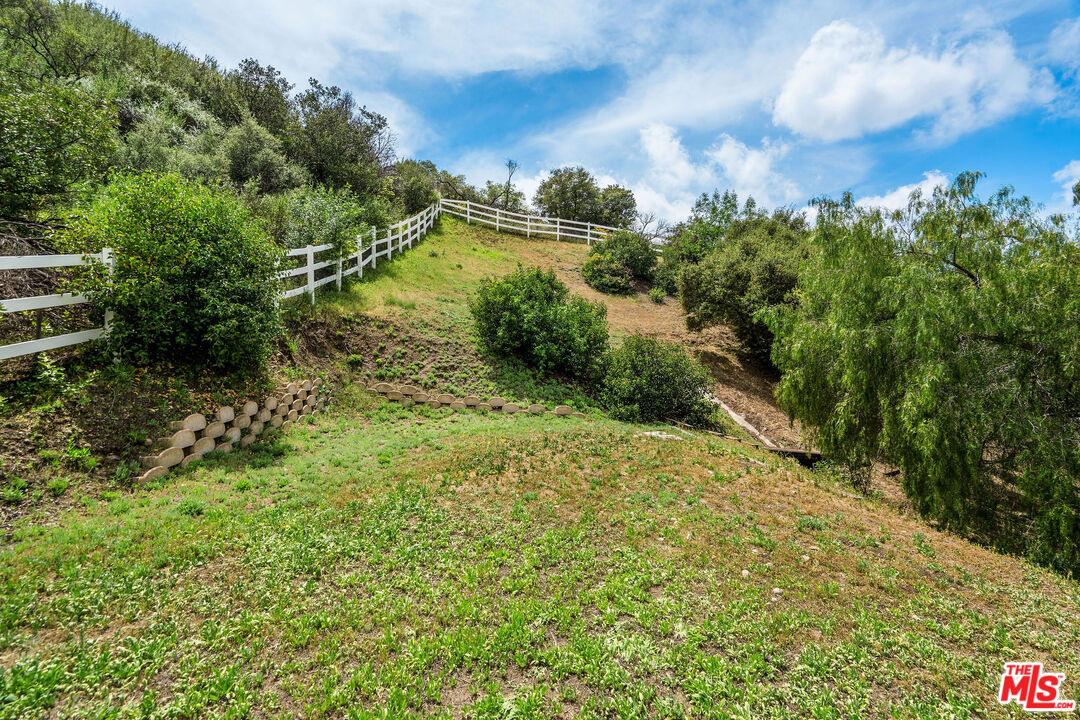 204 Bell Cyn Road Bell Canyon, CA 91307 - Photo 63 of 75 a view of a lake with a yard
