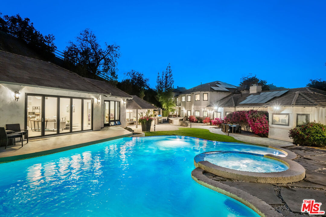 204 Bell Cyn Road Bell Canyon, CA 91307 - Photo 71 of 75 a swimming pool with patio outdoor seating and yard