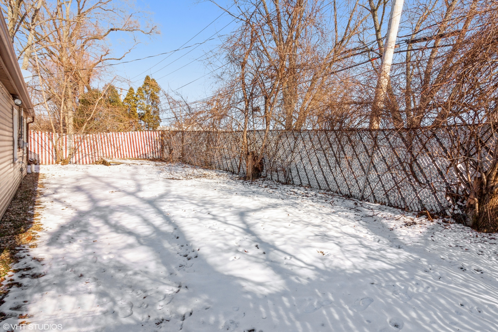 168 North Pinecrest Road Bolingbrook, IL 60440 - Photo 14 of 15 a view of backyard with wooden fence