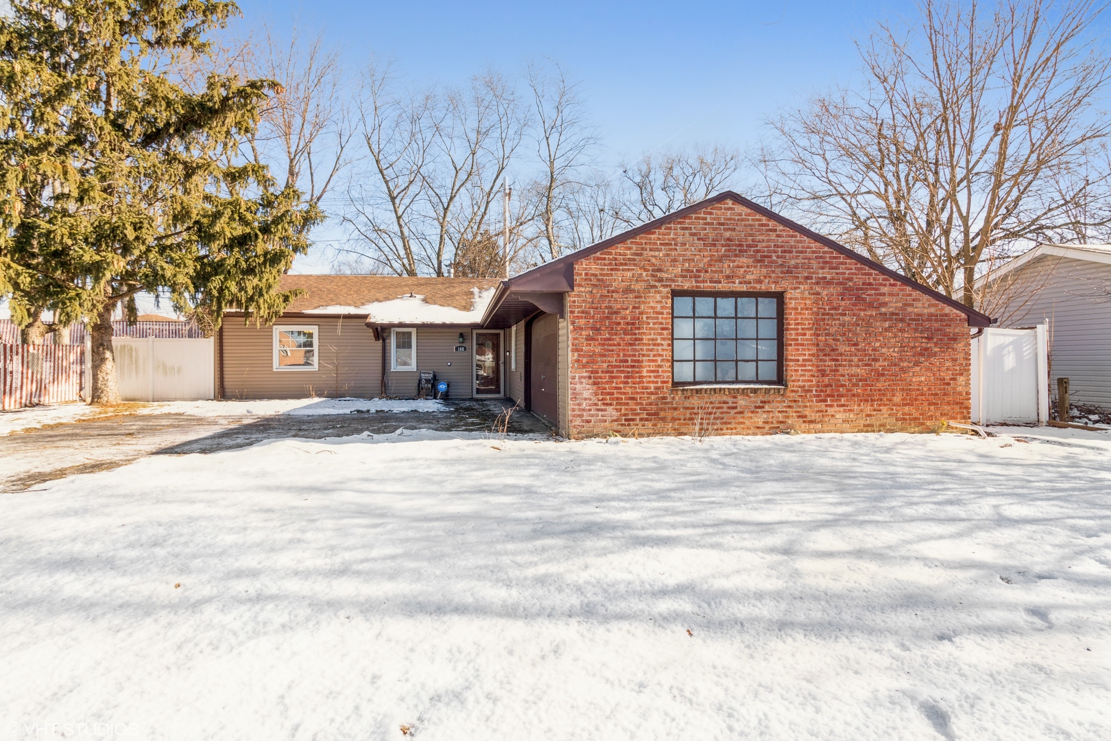 168 North Pinecrest Road Bolingbrook, IL 60440 - Photo 2 of 15 a front view of a house with a yard