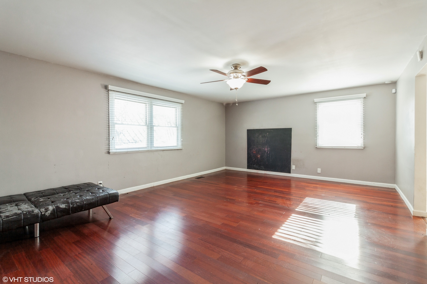 168 North Pinecrest Road Bolingbrook, IL 60440 - Photo 8 of 15 a view of an empty room with wooden floor and a window