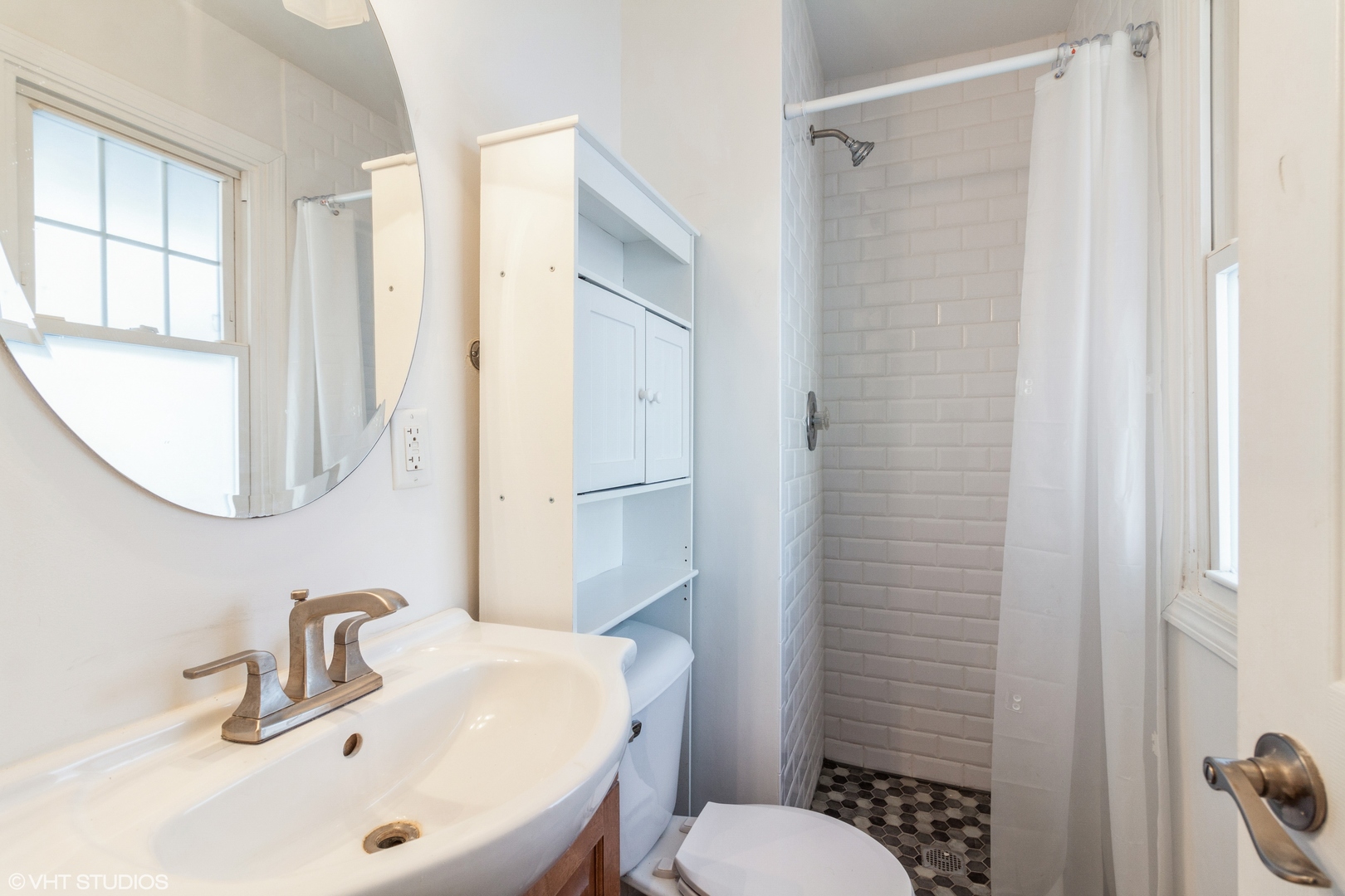 168 North Pinecrest Road Bolingbrook, IL 60440 - Photo 10 of 15 a bathroom with a sink a toilet and a mirror