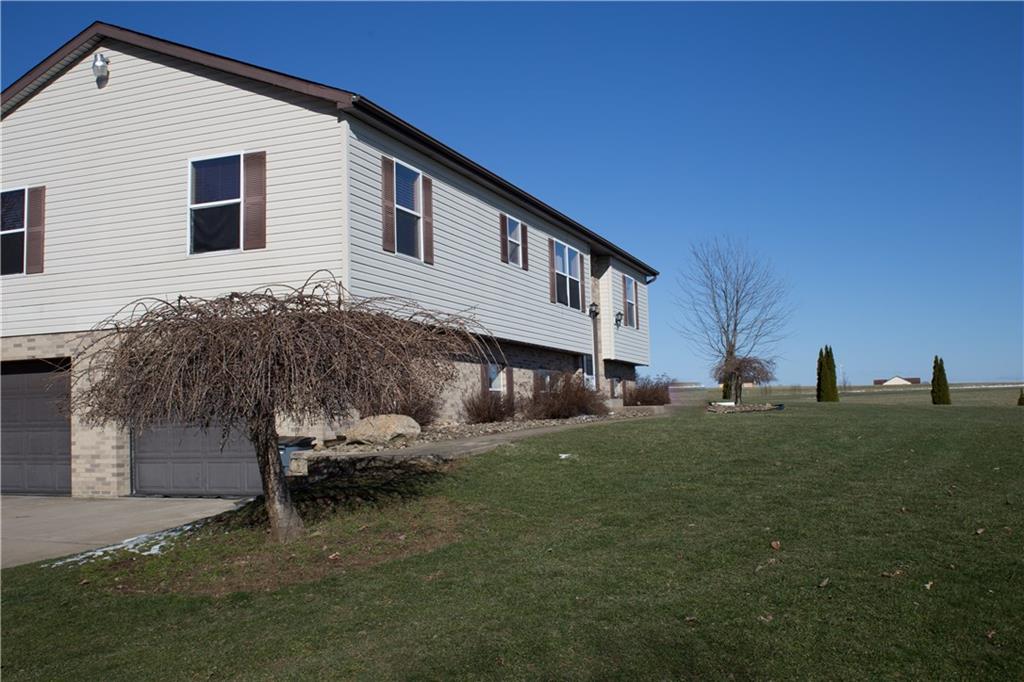595 Coopertown Road Volant, PA 16156 - Photo 2 of 24 Side view of home