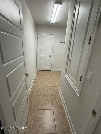 a spacious bathroom with a granite countertop tub sink toilet and shower