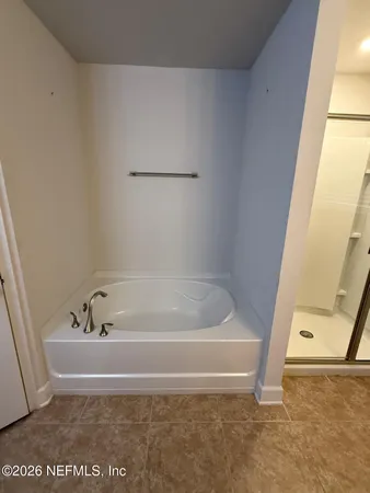 a bathroom with a sink a vanity and a mirror