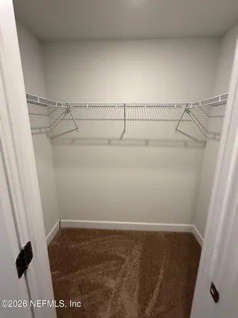 an empty room with closet