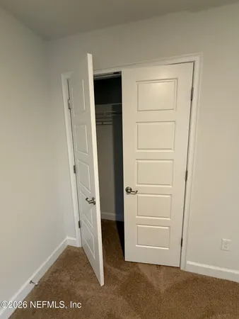 front view of a house with yard