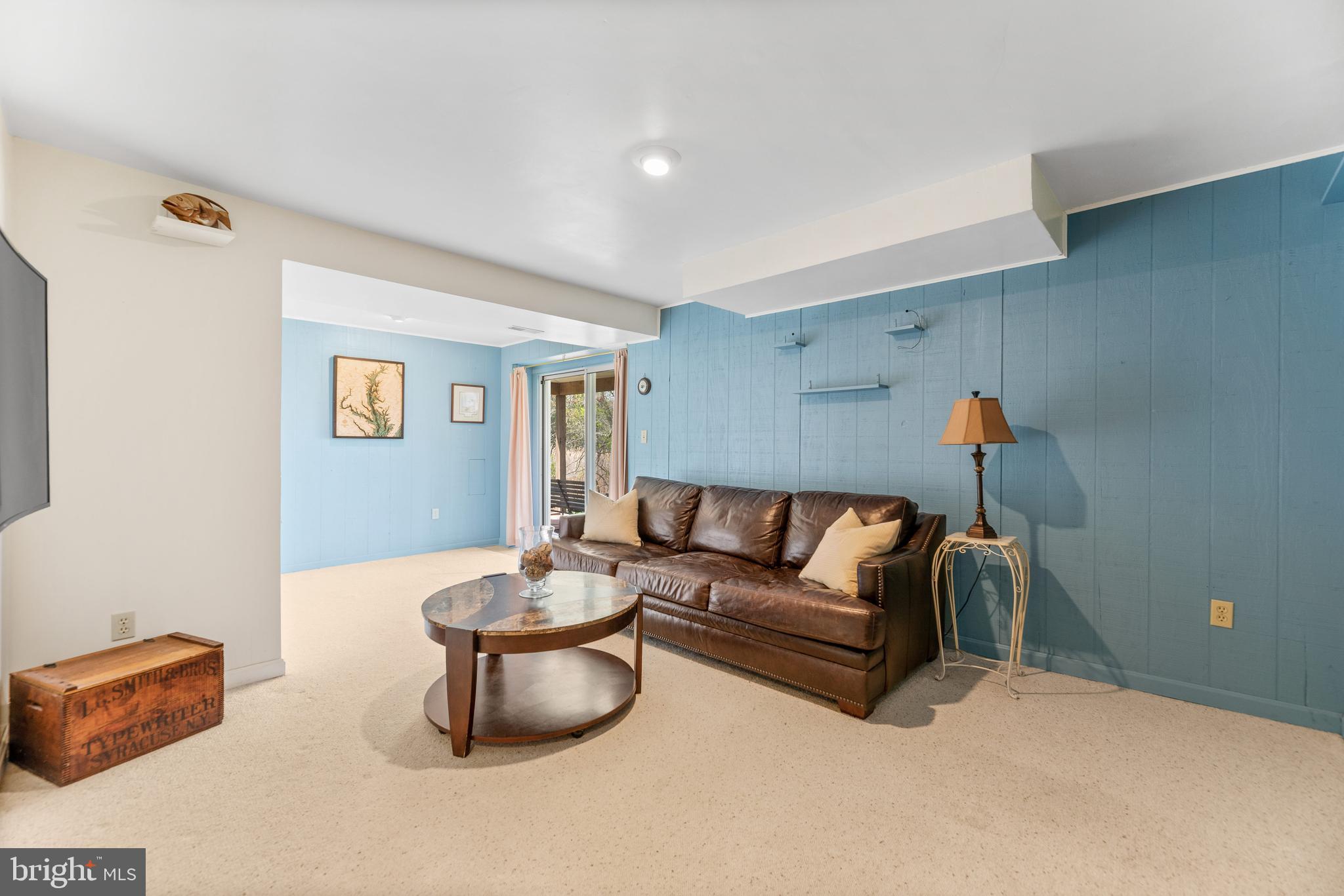 8444 Byrd Road Pasadena, MD 21122 - Photo 24 of 40 Basement rec area with walk out