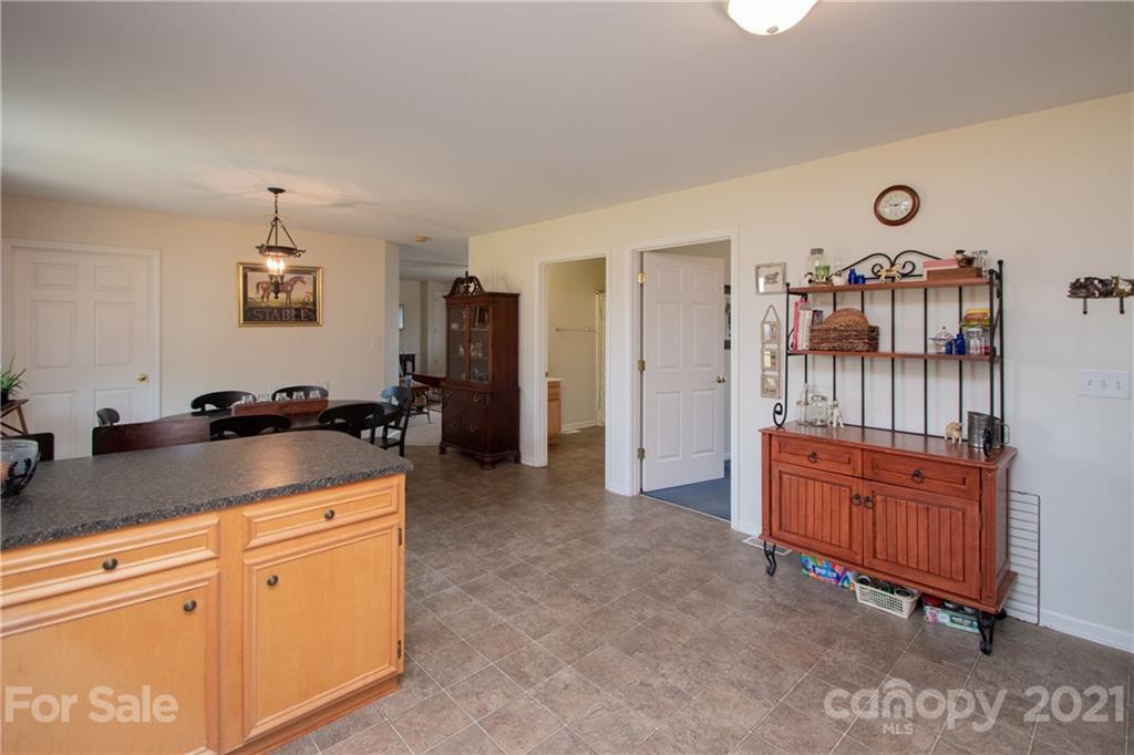 4417 Medlin Road Monroe, NC 28112 - Photo 19 of 30 a view of a kitchen with cabinets