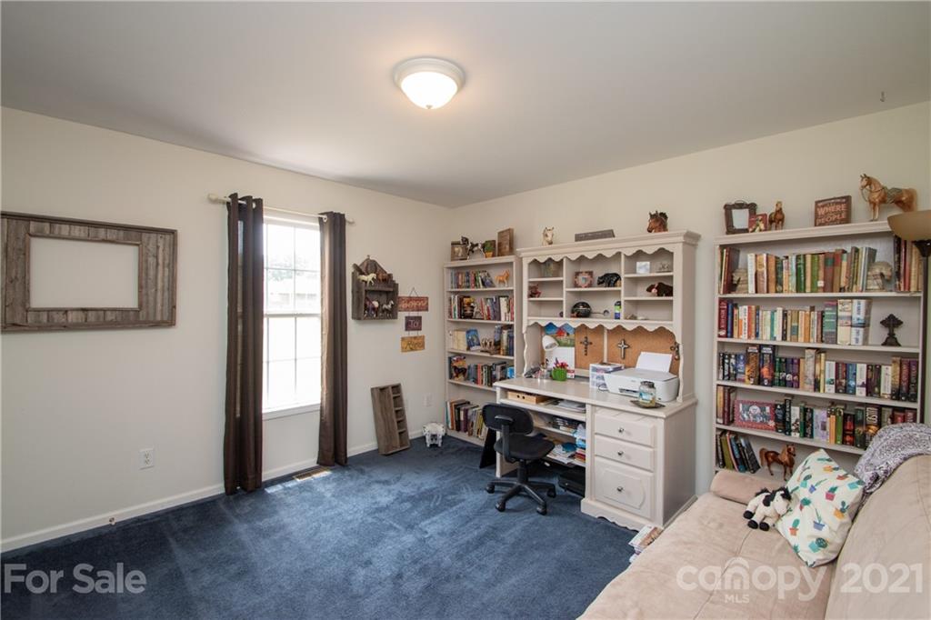 4417 Medlin Road Monroe, NC 28112 - Photo 20 of 30 a view of a workspace with furniture