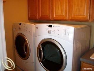 8090 Ruger Ridge Fowlerville, MI 48836 - Photo 15 of 17 8090 washer dryer stay.jpg
