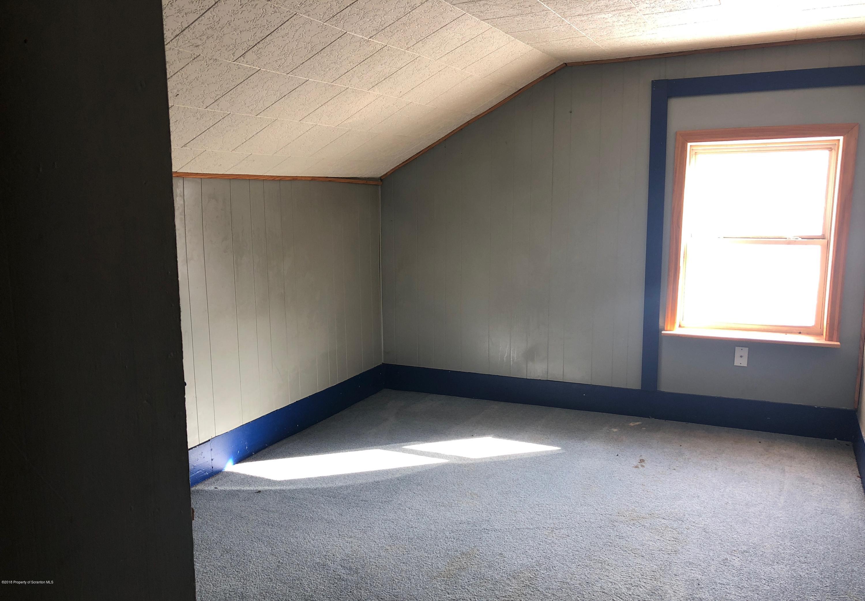 106 Browntown Road Wyalusing, PA 18853 - Photo 8 of 11 an empty room with a window