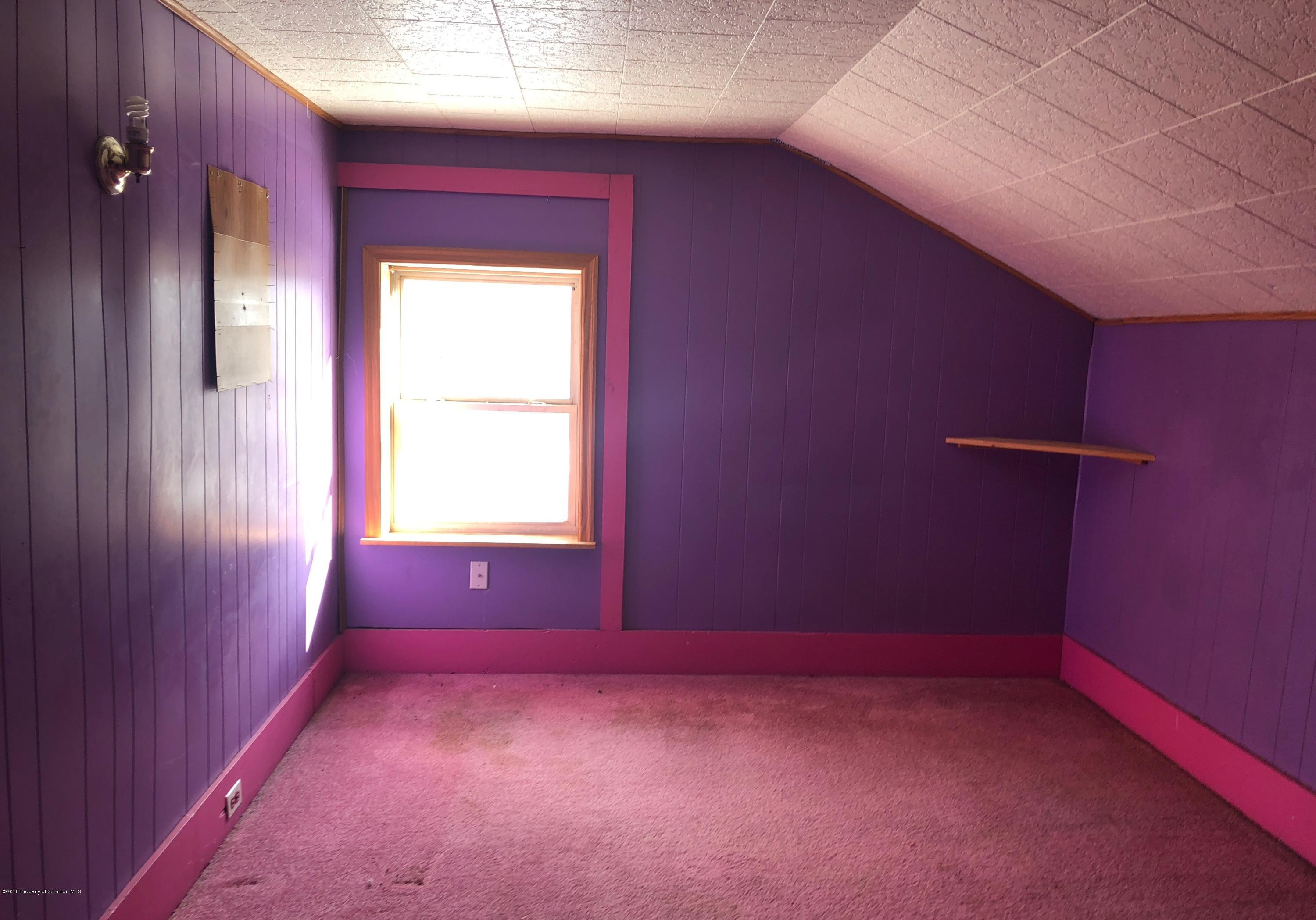 106 Browntown Road Wyalusing, PA 18853 - Photo 9 of 11 an empty room with a window