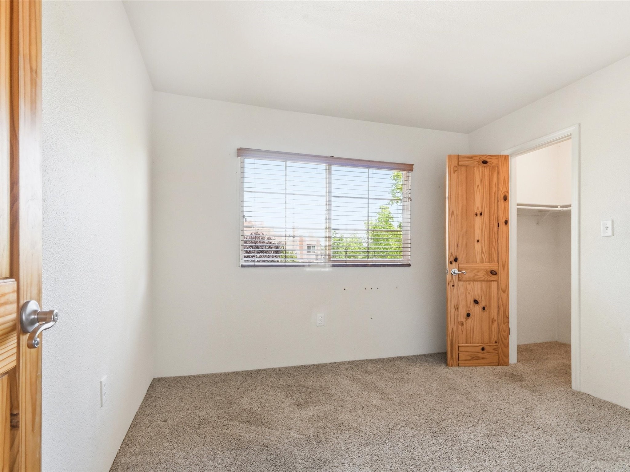 2210 Miguel Chavez Road, Unit 411 Santa Fe, NM 87505 - Photo 27 of 59 Second bedroom with walk in closet
