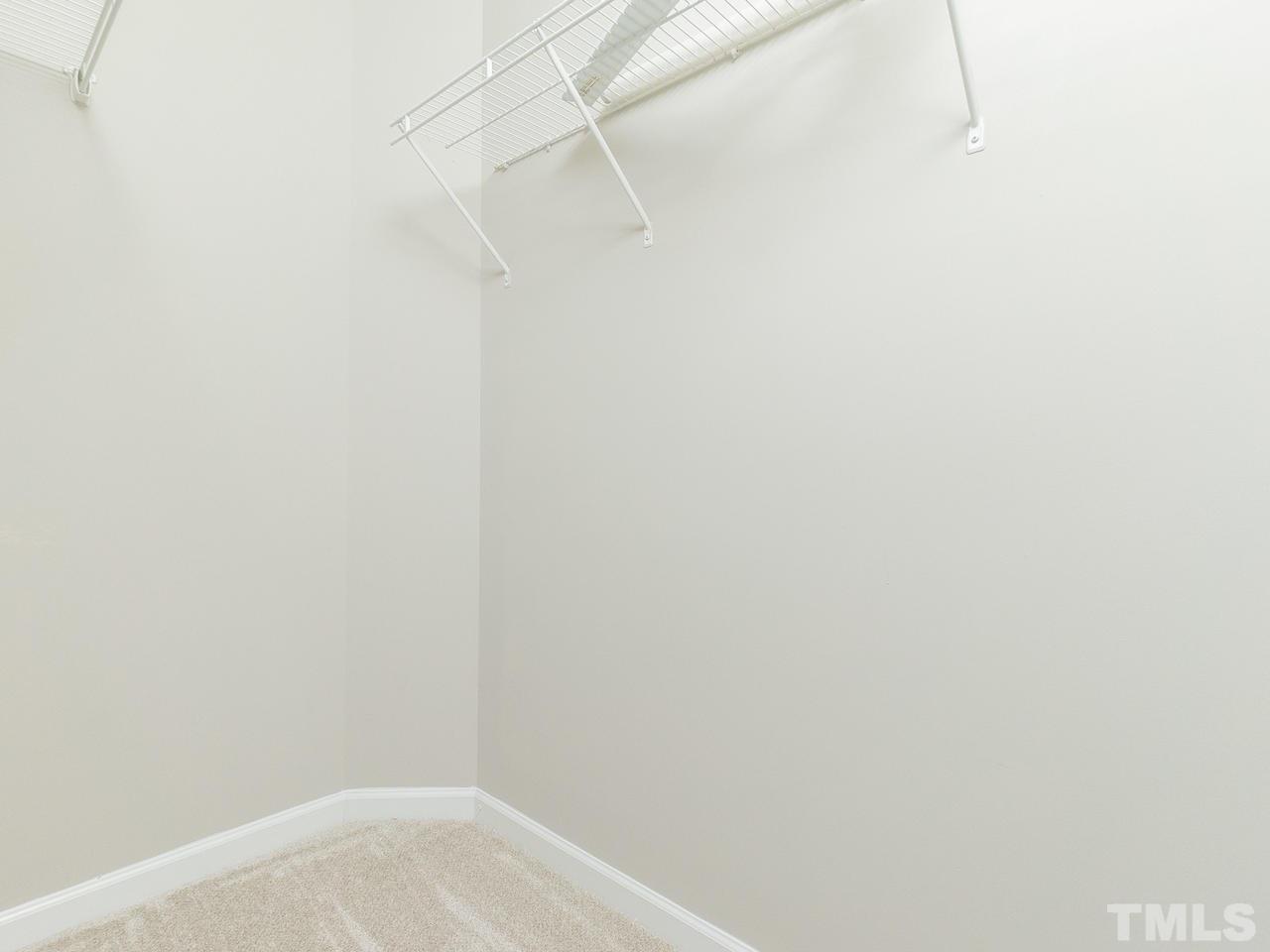 3958 Patriot Ridge Court Raleigh, NC 27610 - Photo 19 of 28 a view of small space with racks on the wall