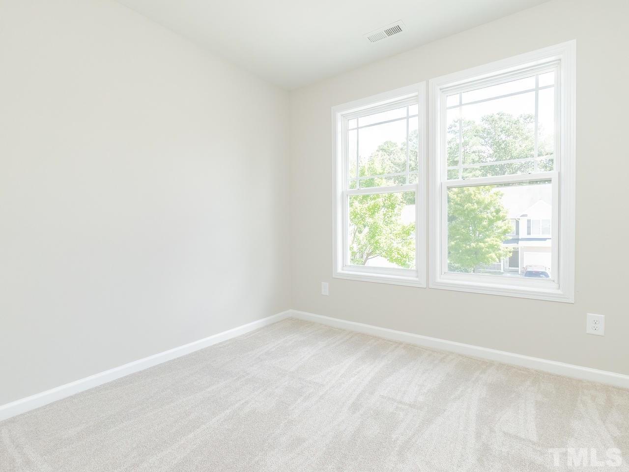 3958 Patriot Ridge Court Raleigh, NC 27610 - Photo 20 of 28 a view of a window in a room