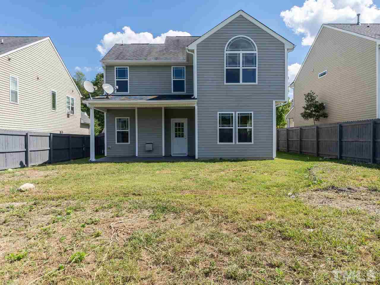 3958 Patriot Ridge Court Raleigh, NC 27610 - Photo 26 of 28 a view of a house with a garden