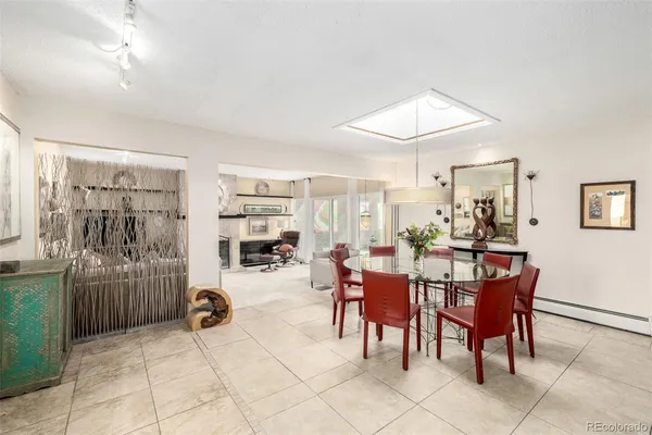 a view of a livingroom with furniture and chandelier