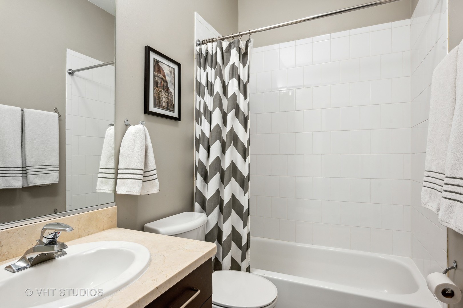 2123 West Rice Street, Unit 3W Chicago, IL 60622 - Photo 15 of 17 a bathroom with a sink and a mirror