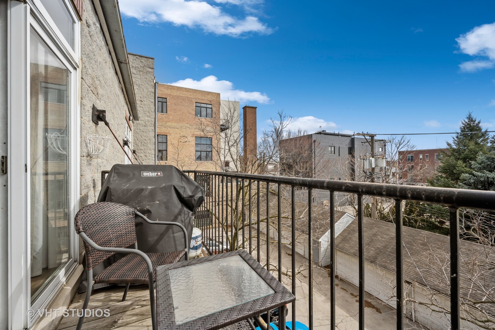 2123 West Rice Street, Unit 3W Chicago, IL 60622 - Photo 16 of 17 a view of a balcony with furniture