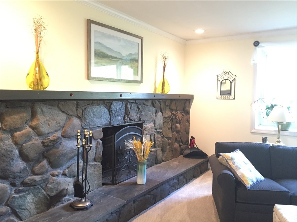 10 Duffield Road Bristol, RI 02809 - Photo 13 of 37 Beautifully maintained stone fireplace.