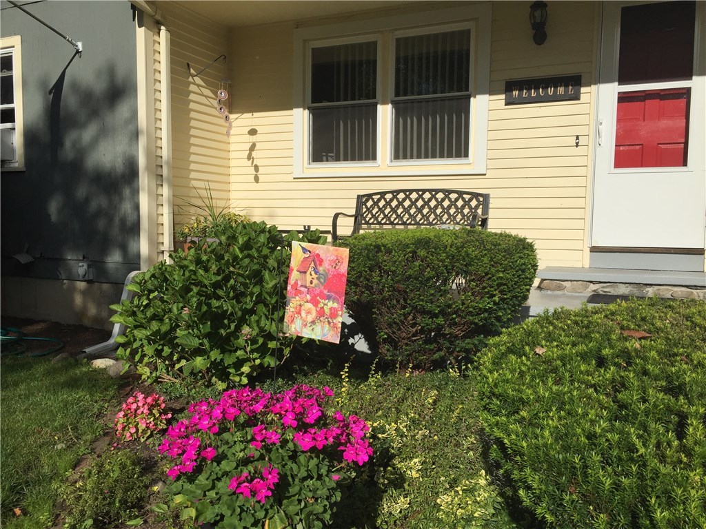 10 Duffield Road Bristol, RI 02809 - Photo 15 of 37 Side entrance gardens and front porch for enjoying daily sunsets.