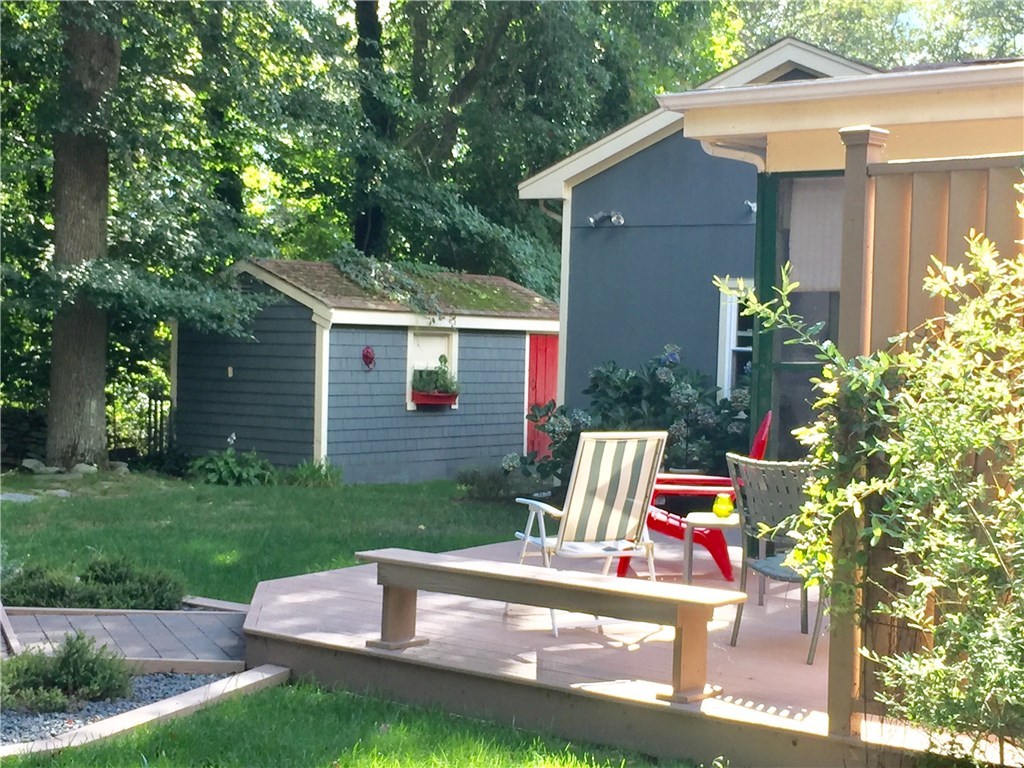 10 Duffield Road Bristol, RI 02809 - Photo 29 of 37 Garden shed is tucked in the corner for additional storage space.