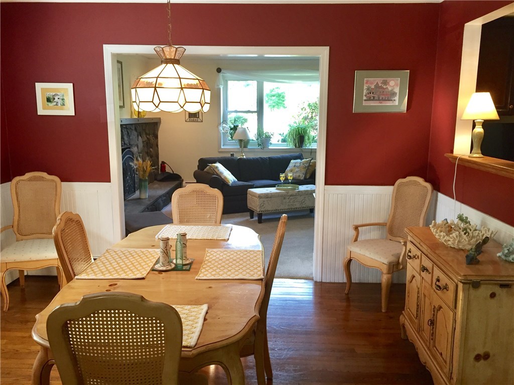 10 Duffield Road Bristol, RI 02809 - Photo 10 of 37 Formal dining room enters into generous sized living room with wood burning fireplace.