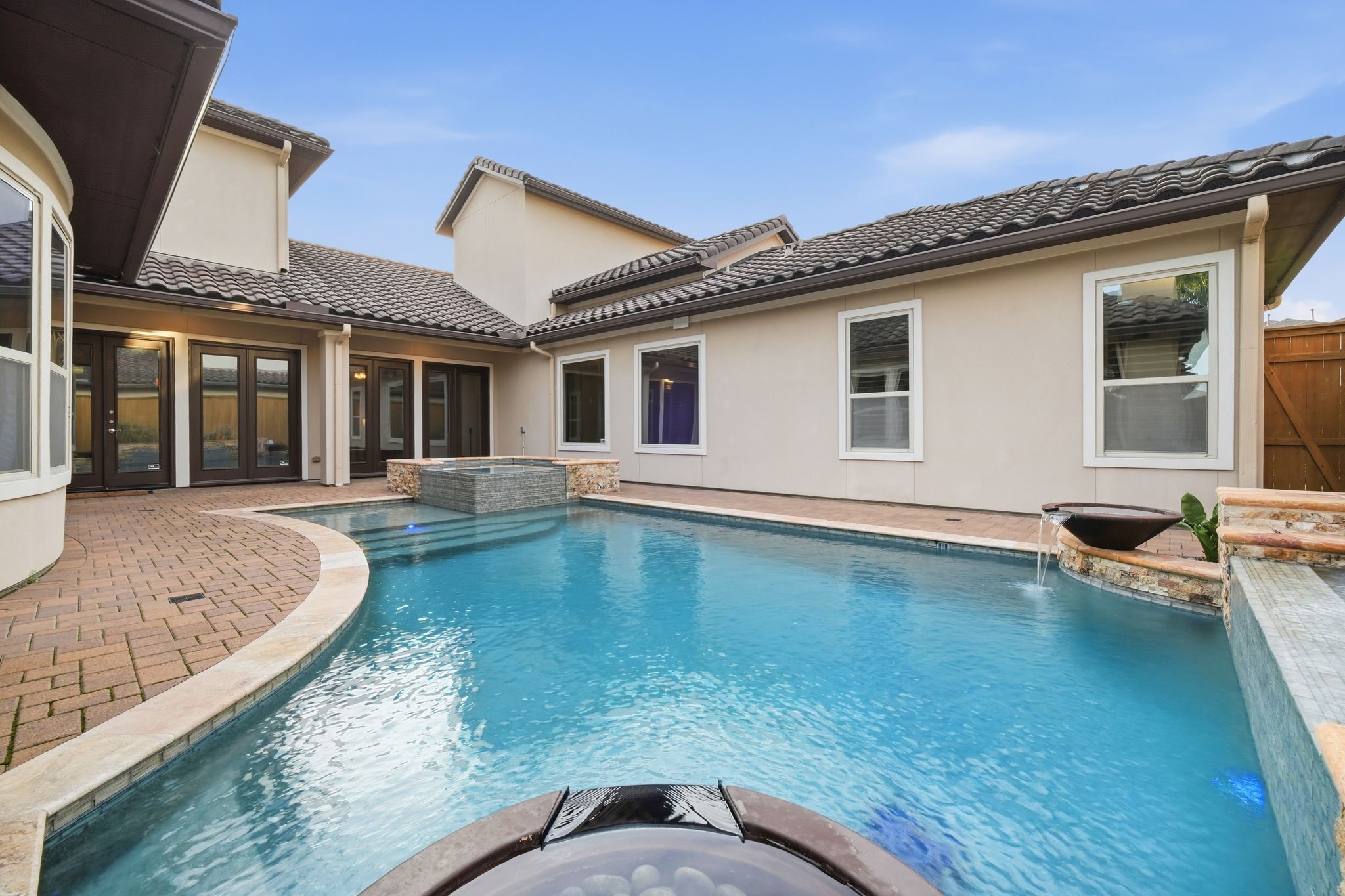5815 Stratton Woods Drive Spring, TX 77389 - Photo 28 of 45 a swimming pool with outdoor seating