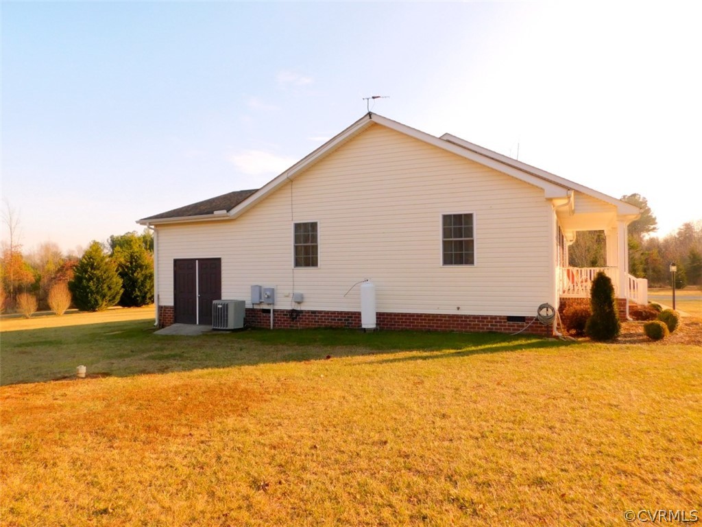 566 Fanny White Road Buckingham, VA 23921 - Photo 18 of 21 a view of a house with a backyard