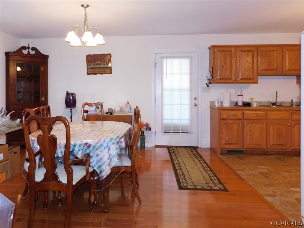 566 Fanny White Road Buckingham, VA 23921 - Photo 6 of 21 a bed room with a bed and furniture