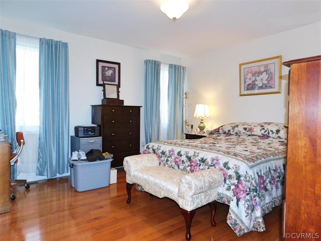 566 Fanny White Road Buckingham, VA 23921 - Photo 10 of 21 a bedroom with a bed and a table