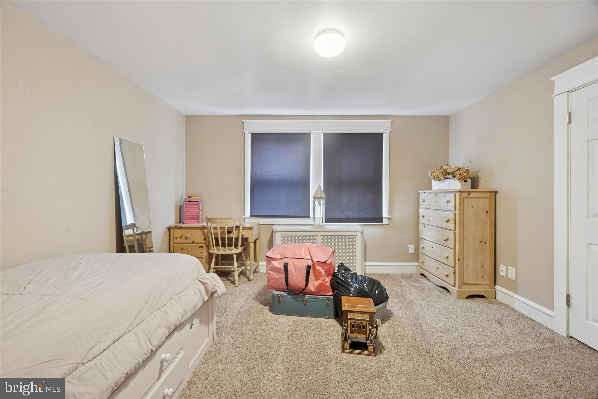 265 West Ridley Avenue Ridley Park, PA 19078 - Photo 17 of 25 a bedroom with furniture and natural light