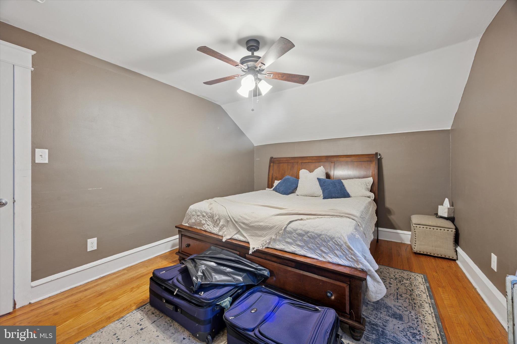 265 West Ridley Avenue Ridley Park, PA 19078 - Photo 20 of 25 a bedroom with a bed and a chandelier