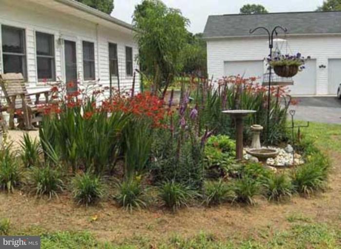 1330 Cox Road Huntingtown, MD 20639 - Photo 11 of 17 Garden