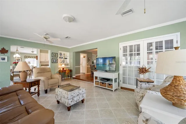 a view of a livingroom with furniture and wooden floor