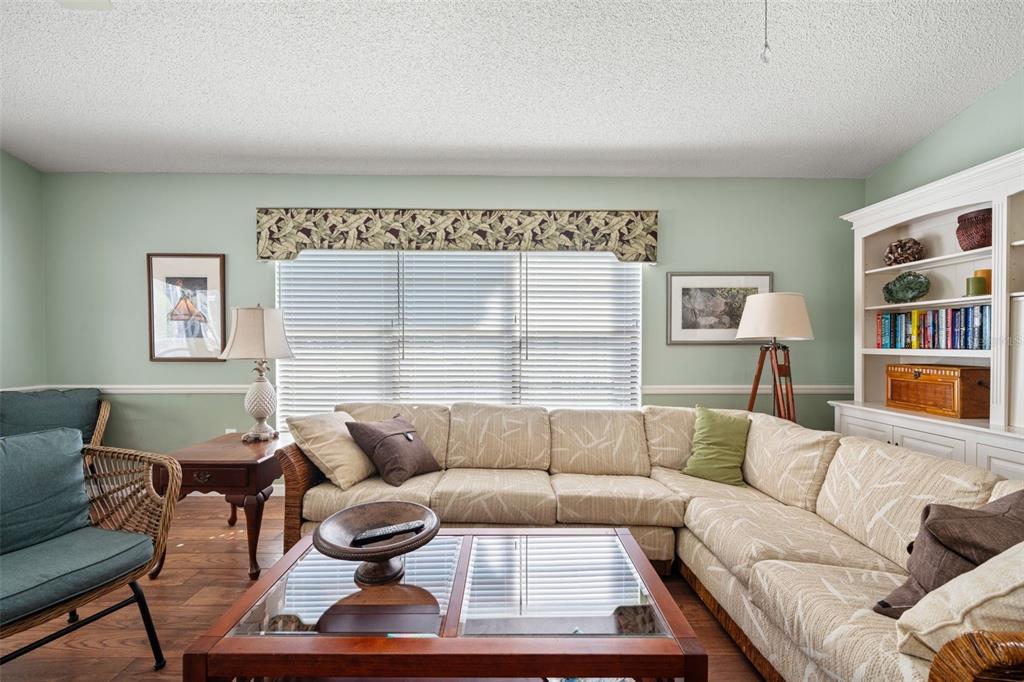 2647 Royal Ridge Drive Spring Hill, FL 34606 - Photo 20 of 73 a living room with furniture and a large window
