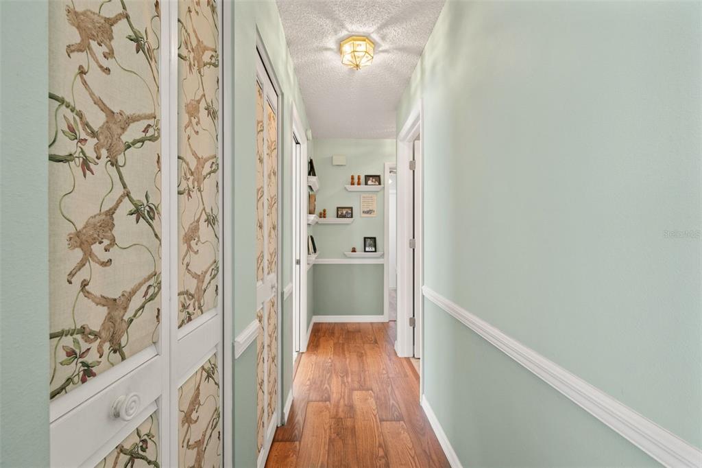 2647 Royal Ridge Drive Spring Hill, FL 34606 - Photo 38 of 73 a view of a hallway with wooden floor and staircase