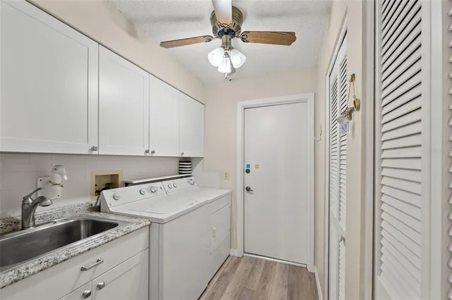 a view of a lake with a yard