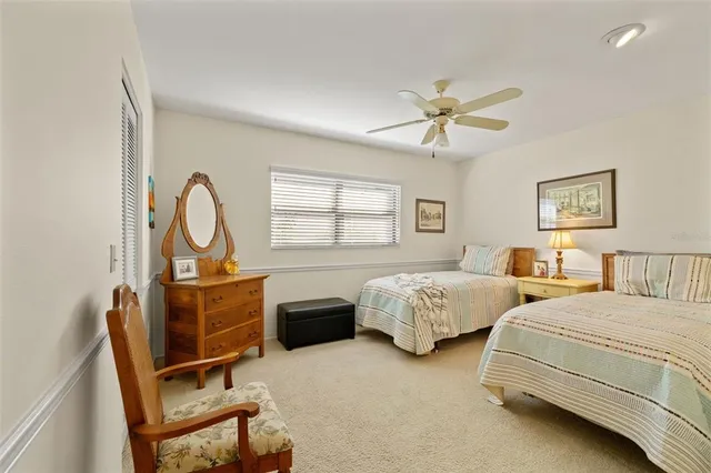 an aerial view of residential houses with outdoor space and street view