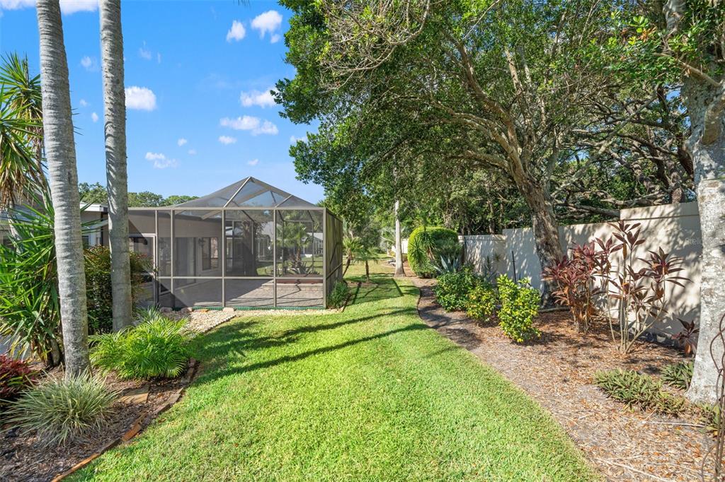 2647 Royal Ridge Drive Spring Hill, FL 34606 - Photo 57 of 73 a view of a chair and table in backyard of the house