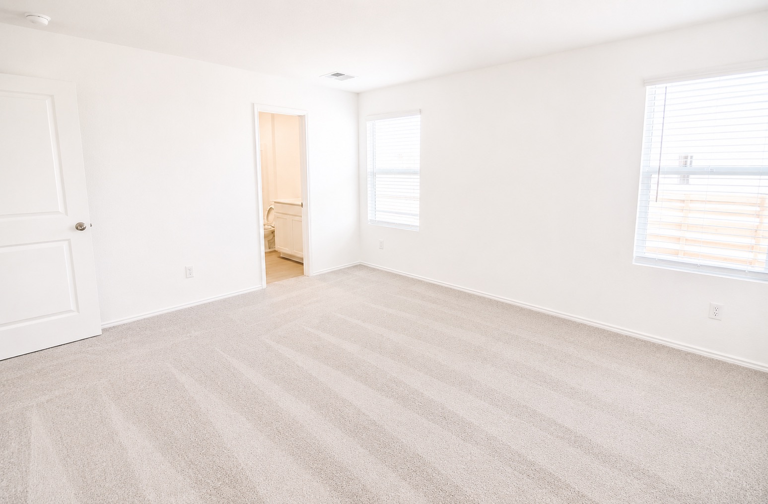 397 Keefer Kyle, TX 78640 - Photo 28 of 33 A spacious, airy bedroom features plush carpeting and abundant natural illumination.