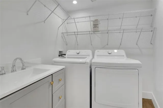 a utility room with dryer and washer