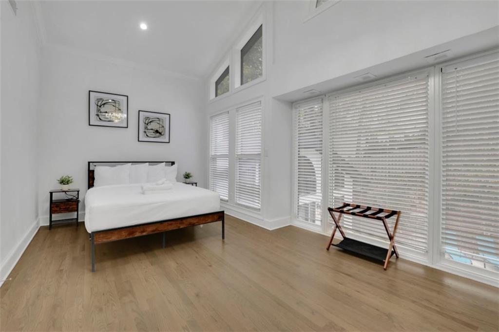 3018 West Pine Valley Road Northwest Atlanta, GA 30305 - Photo 42 of 47 a bedroom with a bed and a window