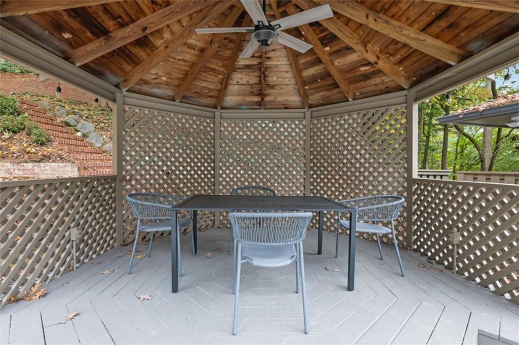 3018 West Pine Valley Road Northwest Atlanta, GA 30305 - Photo 43 of 47 a view of a chairs and table in the patio