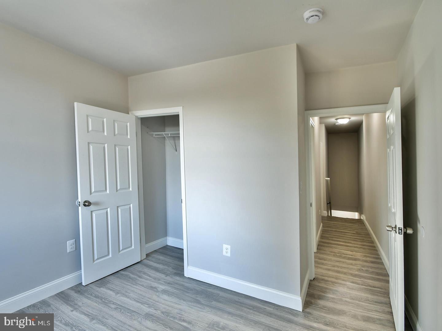 2605 Kirk Avenue Baltimore, MD 21218 - Photo 12 of 17 a view of a hallway with wooden floor