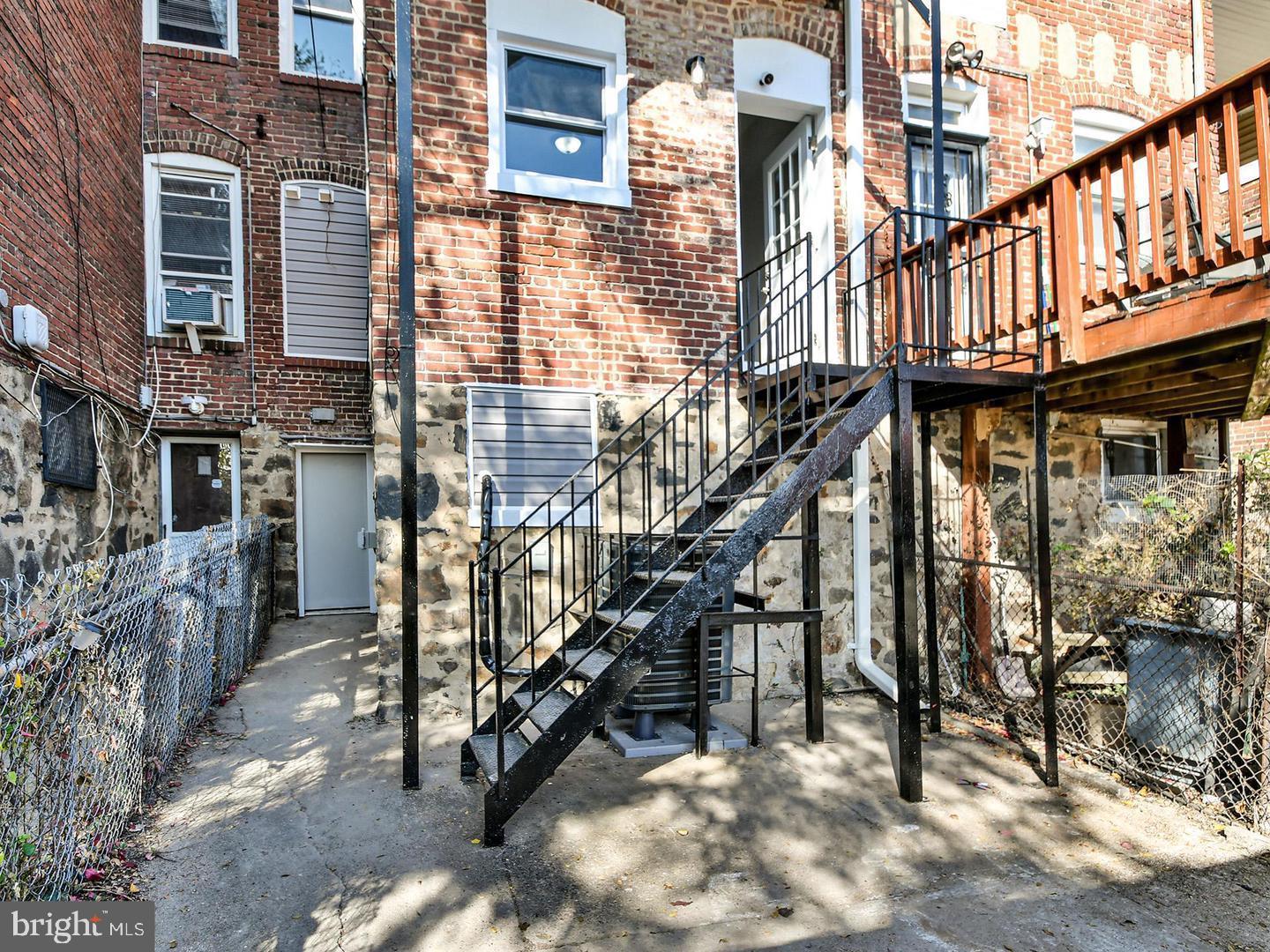 2605 Kirk Avenue Baltimore, MD 21218 - Photo 16 of 17 a view of a house with iron stairs